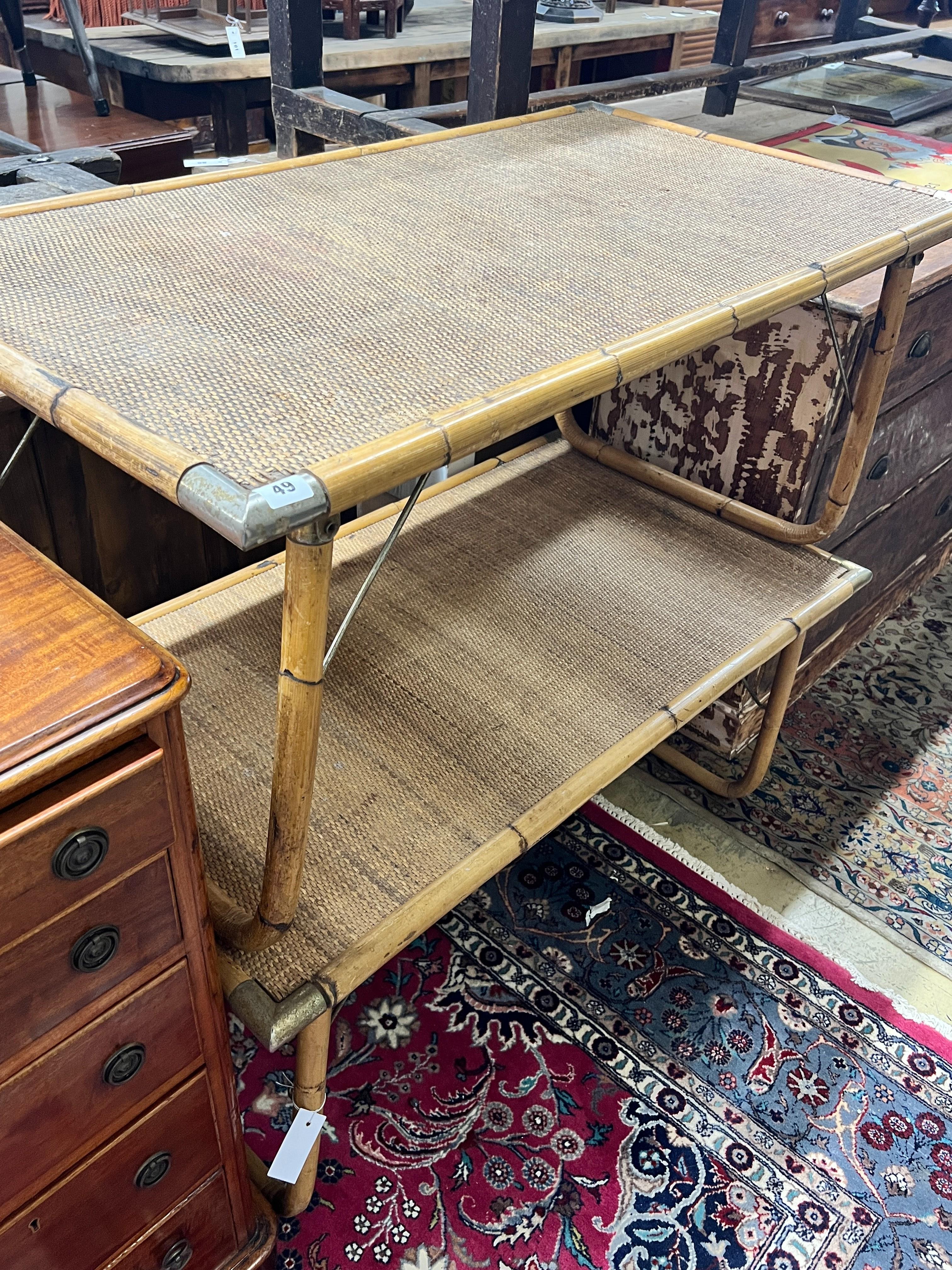 A pair of rectangular folding caned bamboo and rattan low tables, width 110cm, depth 60cm, height 52cm